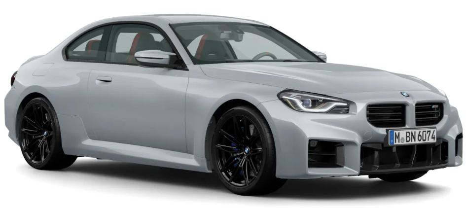 BMW M2 2025 front three-quarter view in light grey with aggressive bumper, kidney grille, and black alloy wheels.