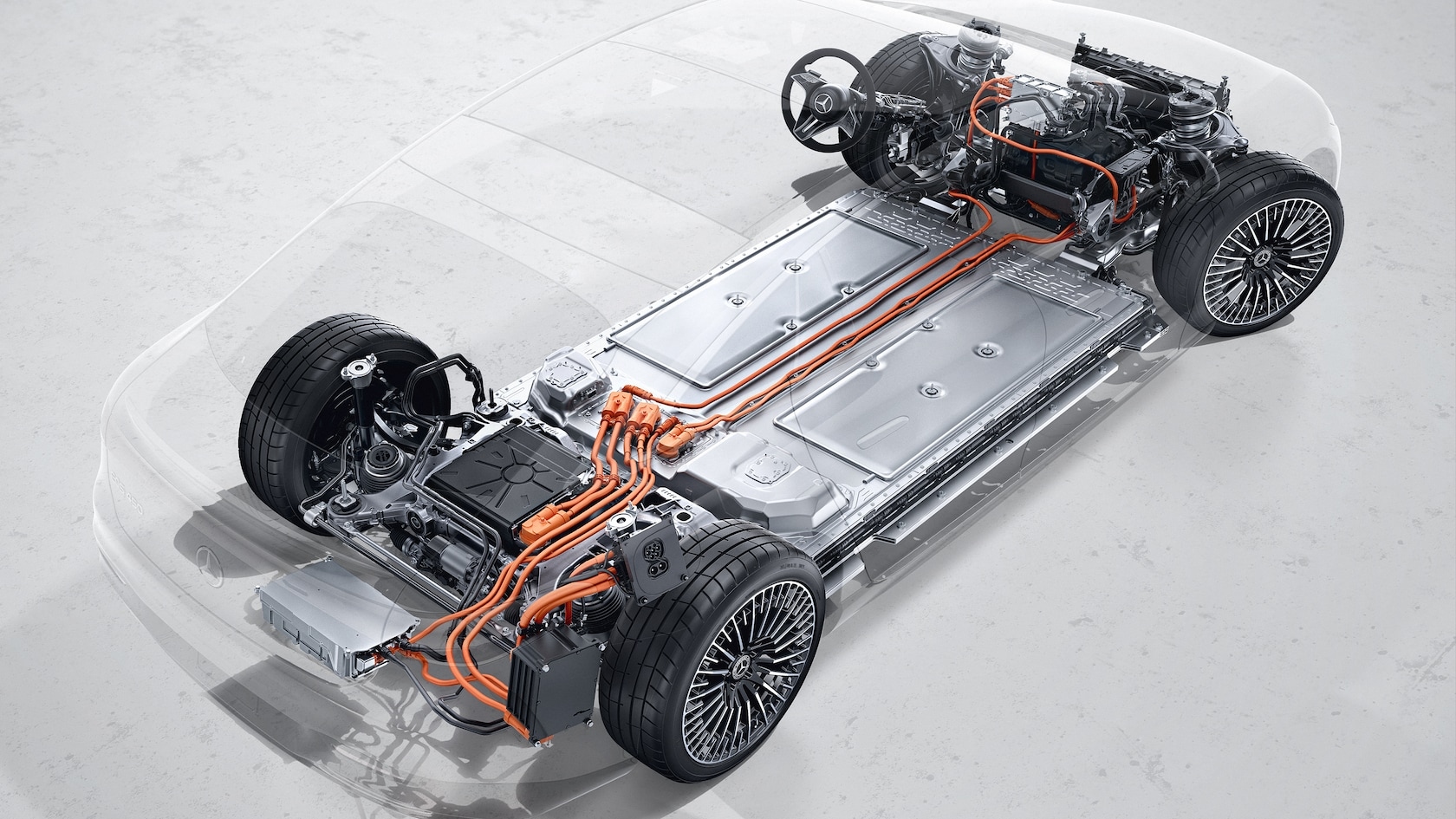 Mercedes-Benz EQS 580 electric vehicle platform revealing battery pack, wiring architecture, and motor layout.