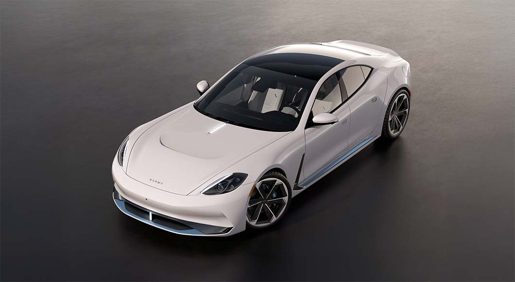 Karma GS-6 electric luxury sedan in white, shown from a high angled front view.