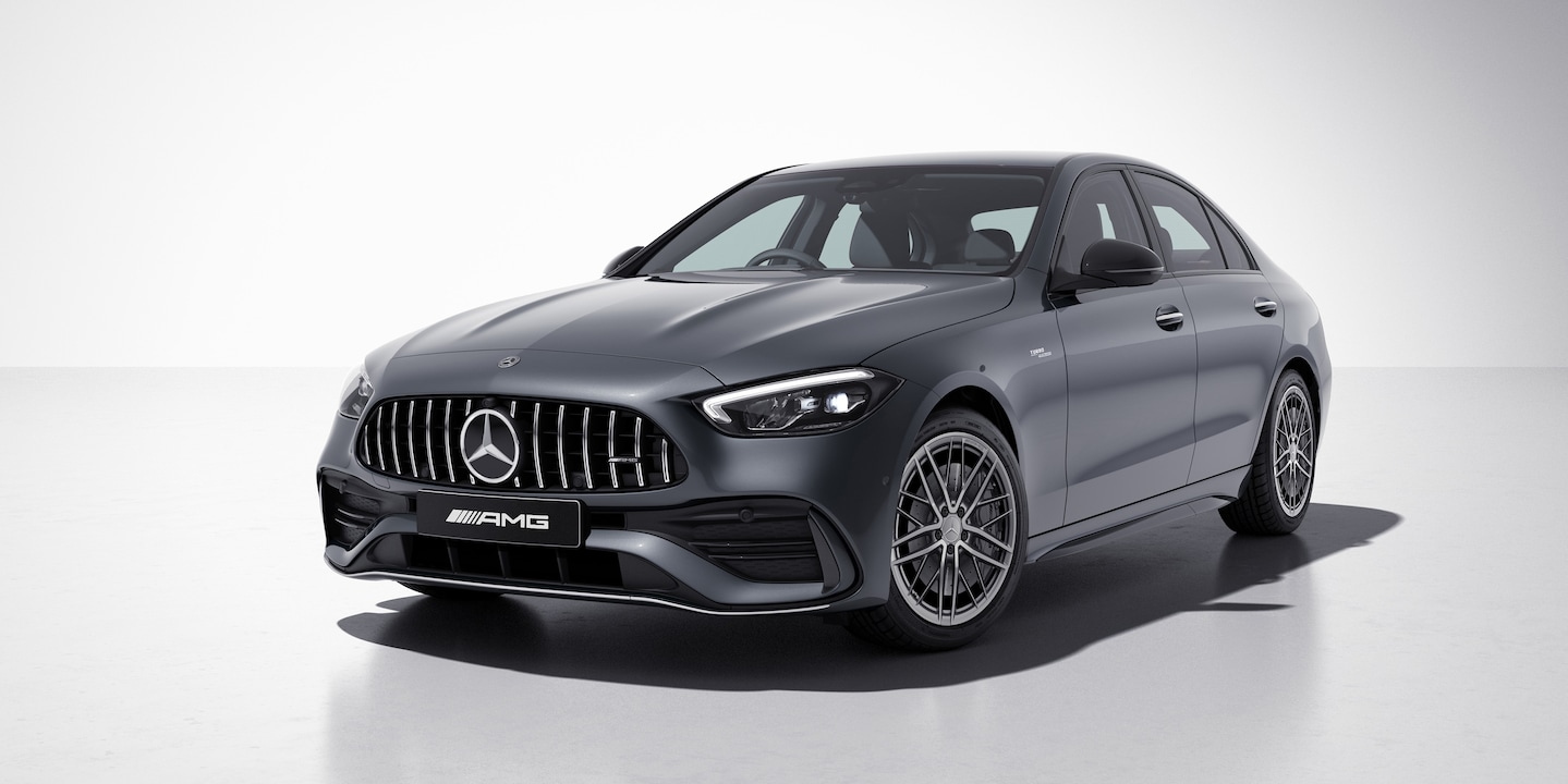 Front-angle view of the Mercedes-AMG C43 4MATIC sedan with signature AMG grille and sporty alloy wheels.